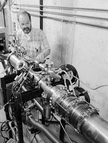 Jim MacLachlan working on electron cooling equipment