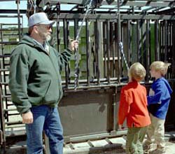 Veteran herdsman Don Hanson gave visitors a tour of facilities used in caring for Fermilab's herd of American bison. 
