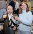 Co-Spokesperson Janet Conrad shares a toast with Taiji Yamanouchi, head of programming at Fermilab