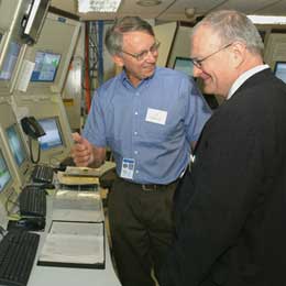 CDF Co-spokesperson Al Goshaw guides OSTP John Marburger at the CDF Main Control Room