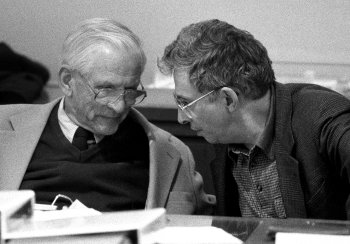 Fermilab Director John Peoples (right) confers with Andy Mravca during the Lab's annual review in 1998.