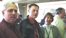 (L-R) Chuck Schmidt, Roger Dixon and Marilyn Dixon at the reception for education volunteers.