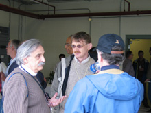 Milorad Popovic (left) talking to Steve Geer and Alan Bross 