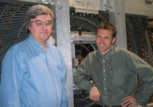 Gerry Bauer (left) of MIT works on the analysis of exotic states and the hardware for the time of flight. Christoph Paus, also of MIT, is the group leader for the MIT group at CDF and does analysis on B-mixing.