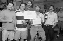 Champagne Celebration with (from left) Salah Chaurize, Marty Murphy, Dave Johnson, Elvin Harms and Chandra Bhat.