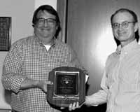 Technical Divsion head Peter Limon accepted plaque for the most improved safety record from Fermilab Director Michaeal Witherell