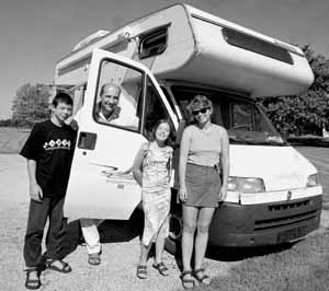  The Bernardi family gather around their mobile home, from left, Jeremy,Greg,Sonia and Marie.