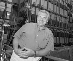 Delmar Miller in front of part of the muon detector at DZero