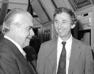 The President of Brazil, Jose Sarney (left), toured the main control room with Fermilab Director John Peeples during his visit to the lab on Sept. 27, 1989.