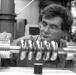 Fermilab physicist Leo Bellantoni tests the first superconducting RF cavity ever built at Fermilab