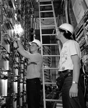  Alex Kupco and Karel Soustruznik work on the central muon detector at DZero
