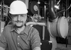 Steve Krstulovich standing inside the Central Utility Building in 1999.