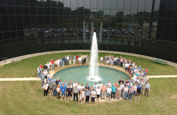 Members of the Computing Division gather outside the Feynman Computing Center.