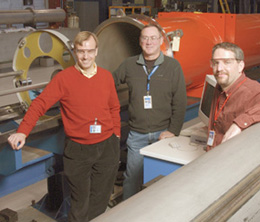 US LHC project manager Jim Strait (left) and Fermilab LHC project manager Jim Kerby (right) flank Fermilab Technical Division head Bob Kephart.