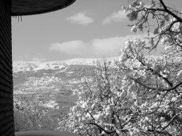 The Gran Sasso mountains from a window in the medieval town of l'Aquila on the morning after a late-winter snowstorm.