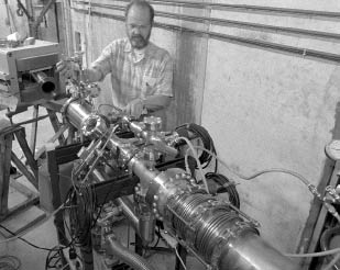 Jim MacLachlan works on electron beam approximations using a low-energy proton beam in 1996.