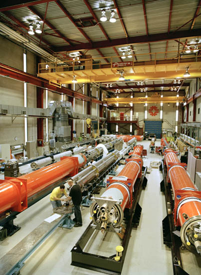 Superconducting quadrupole magnets built at Fermilab's Technical Division. Designed and built at Fermilab, they are destined for the interaction regions of CERN's Large Hadron Collider.
