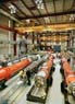 Superconducting quadrupole magnets built at Fermilab's Technical Division. Designed and built at Fermilab, they are destined for the interaction regions of CERN's Large Hadron Collider.