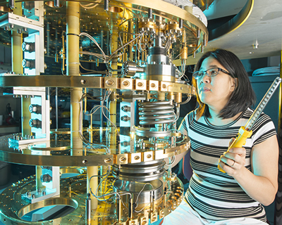 Scientist works on a dilution refrigerator