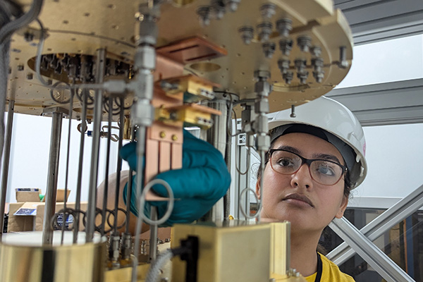 Researcher works on a dilution refrigerator